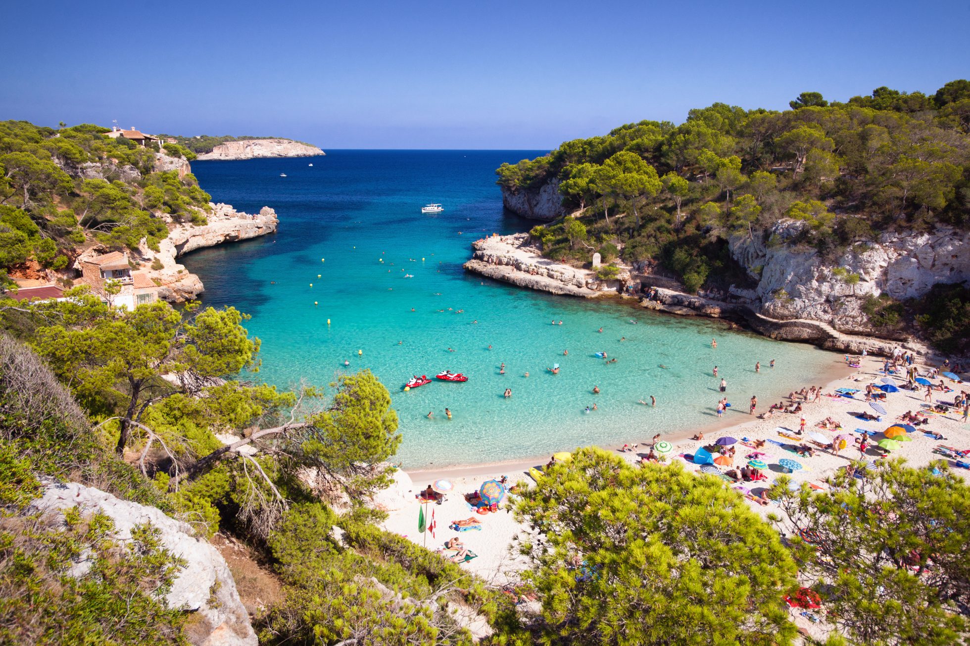 An aerial view of the beach in Cala Llombards bay on Mallorca, Spain.