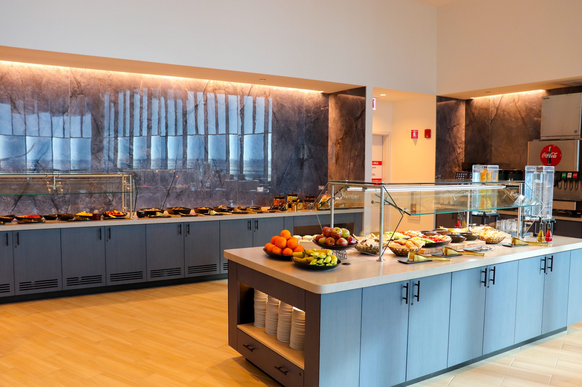Buffet, snacks, and dishes served elegantly - Business Lounge Chicago