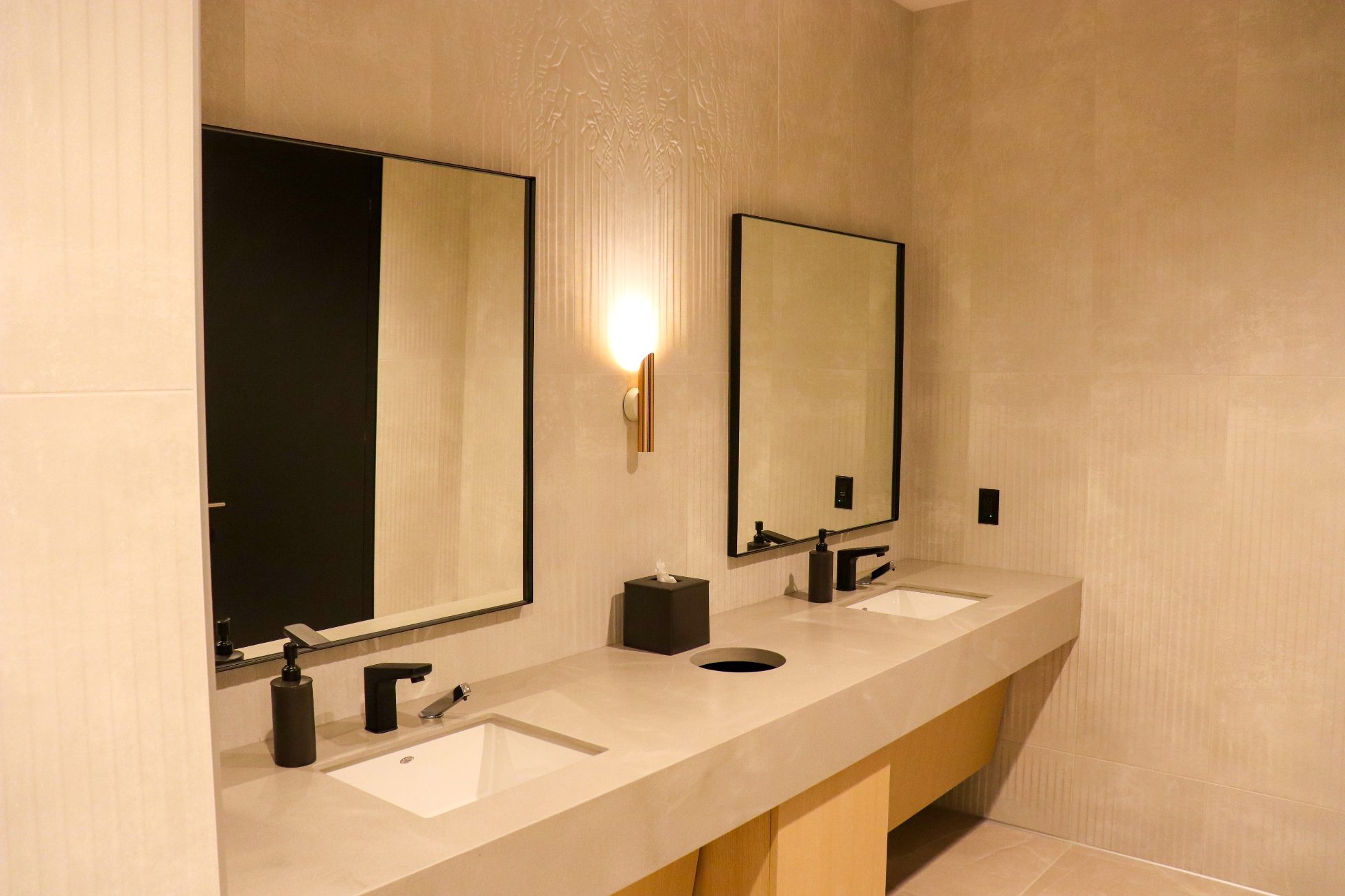 Business Lounge Bathroom, Chicago Airport - warm white space, two mirrors and sinks