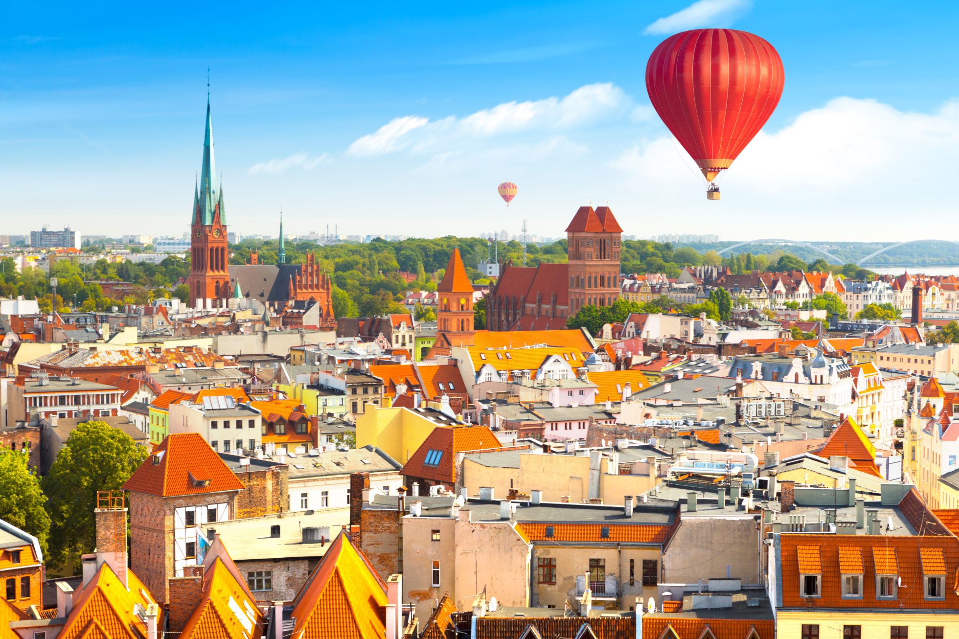 Panoramic aerial view of historic buildings and rooftops in the Polish medieval city of Toruń, Poland