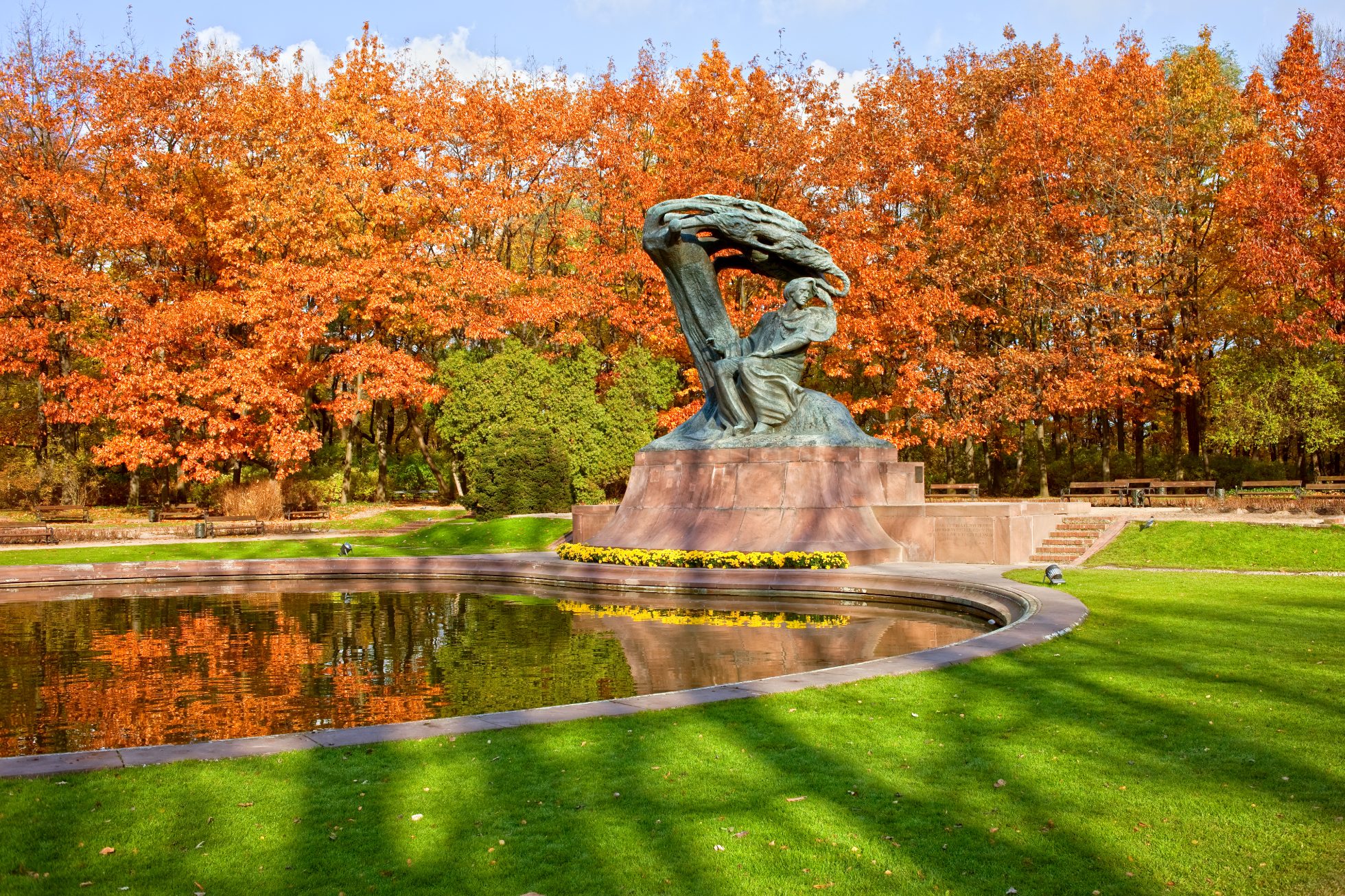 Fryderyk Chopin's monument in autumn in Łazienki Królewskie (Łaźnie Królewskie) in Warsaw, Poland