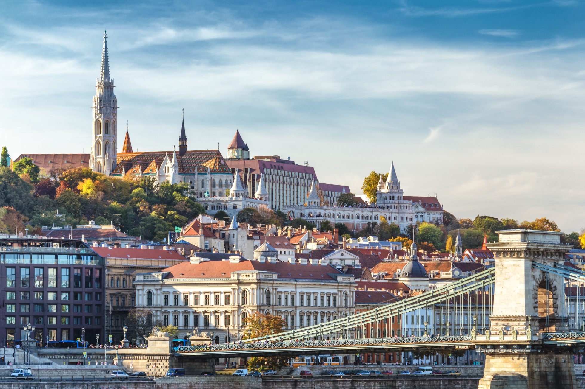 Budapest, Hungary - View of the Parliament building on the Danube riverbank on a sunny day.