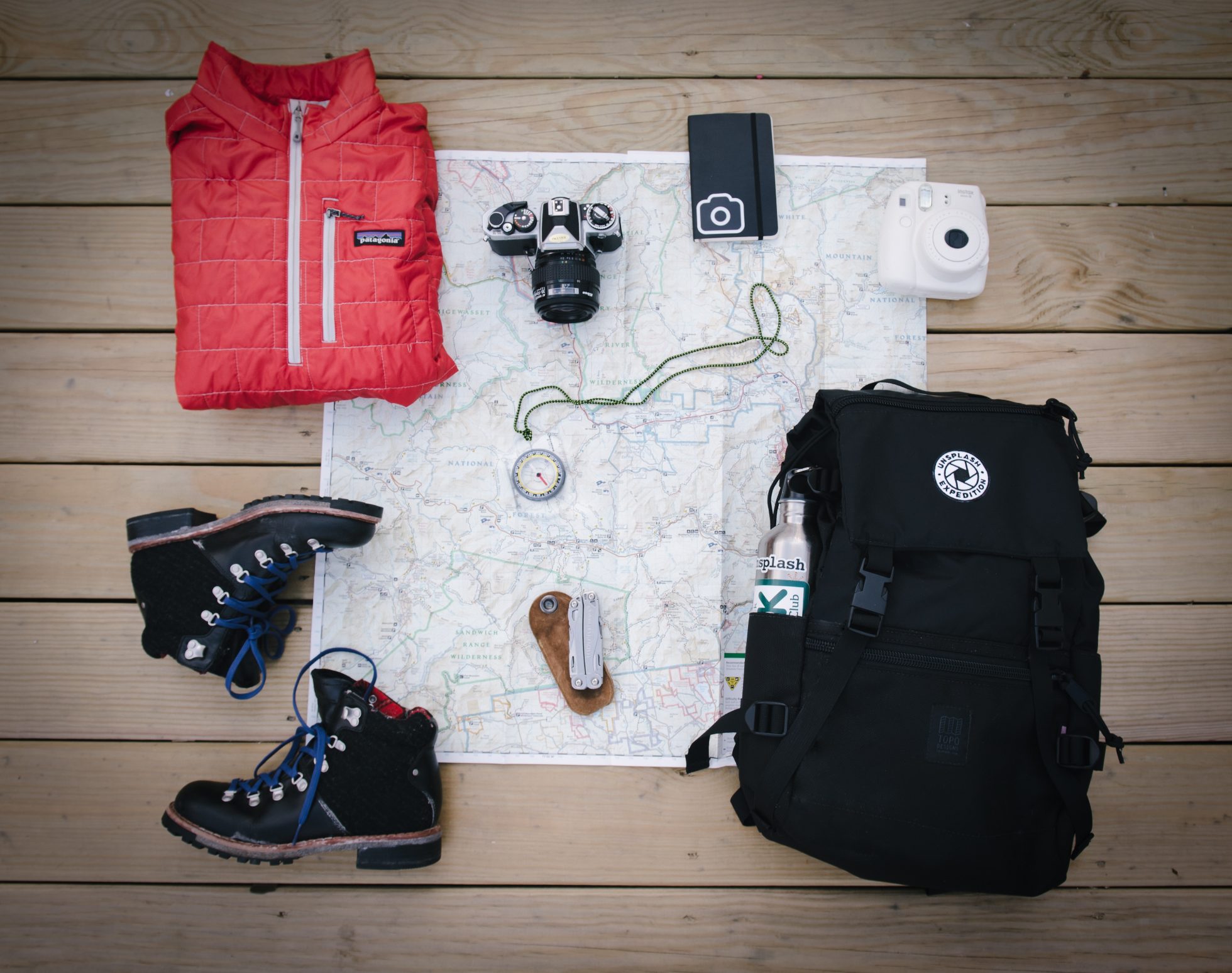 View including: for a backpack, map, jacket and shoes