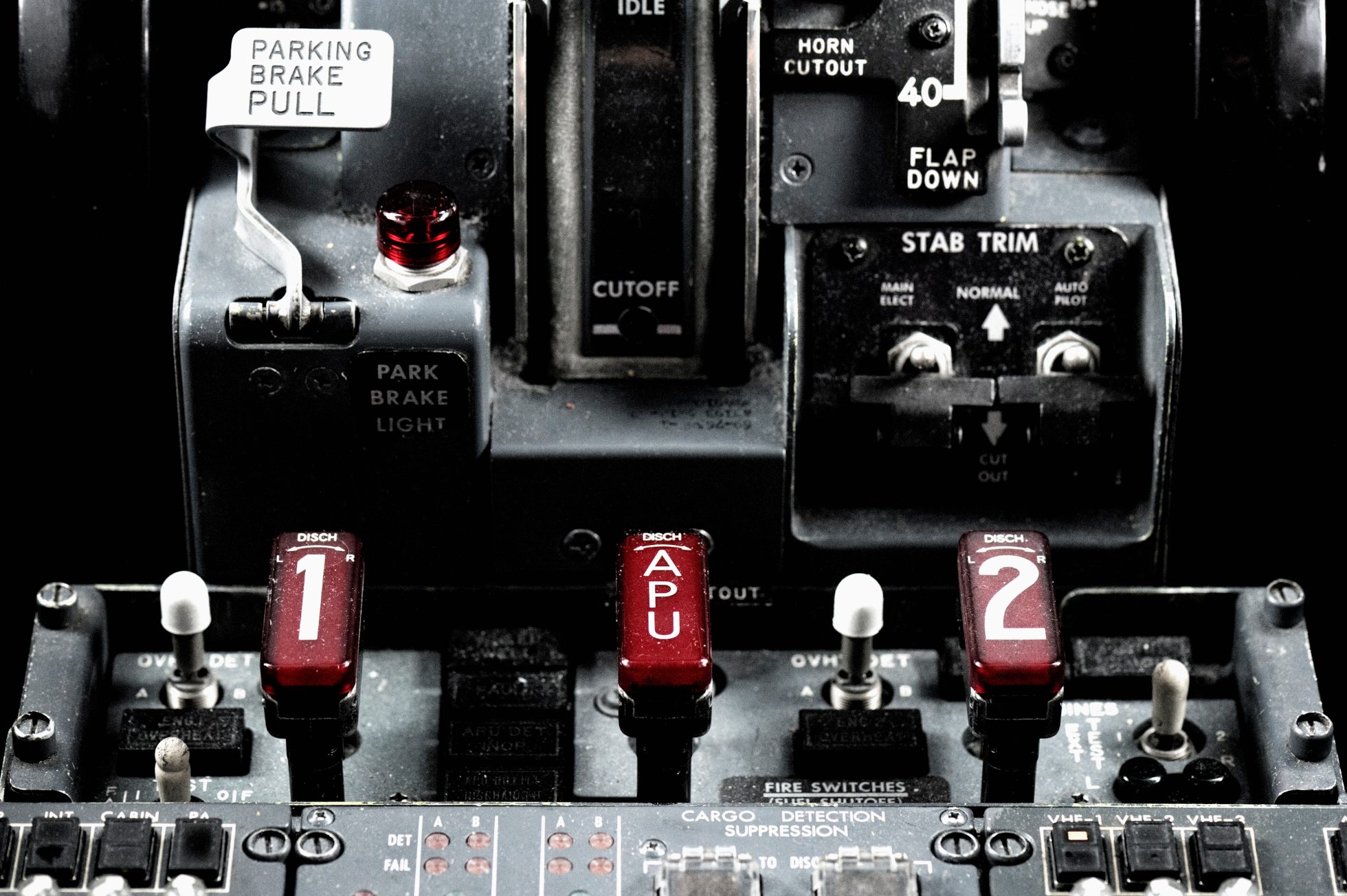 APU fire test button in aircraft cockpit