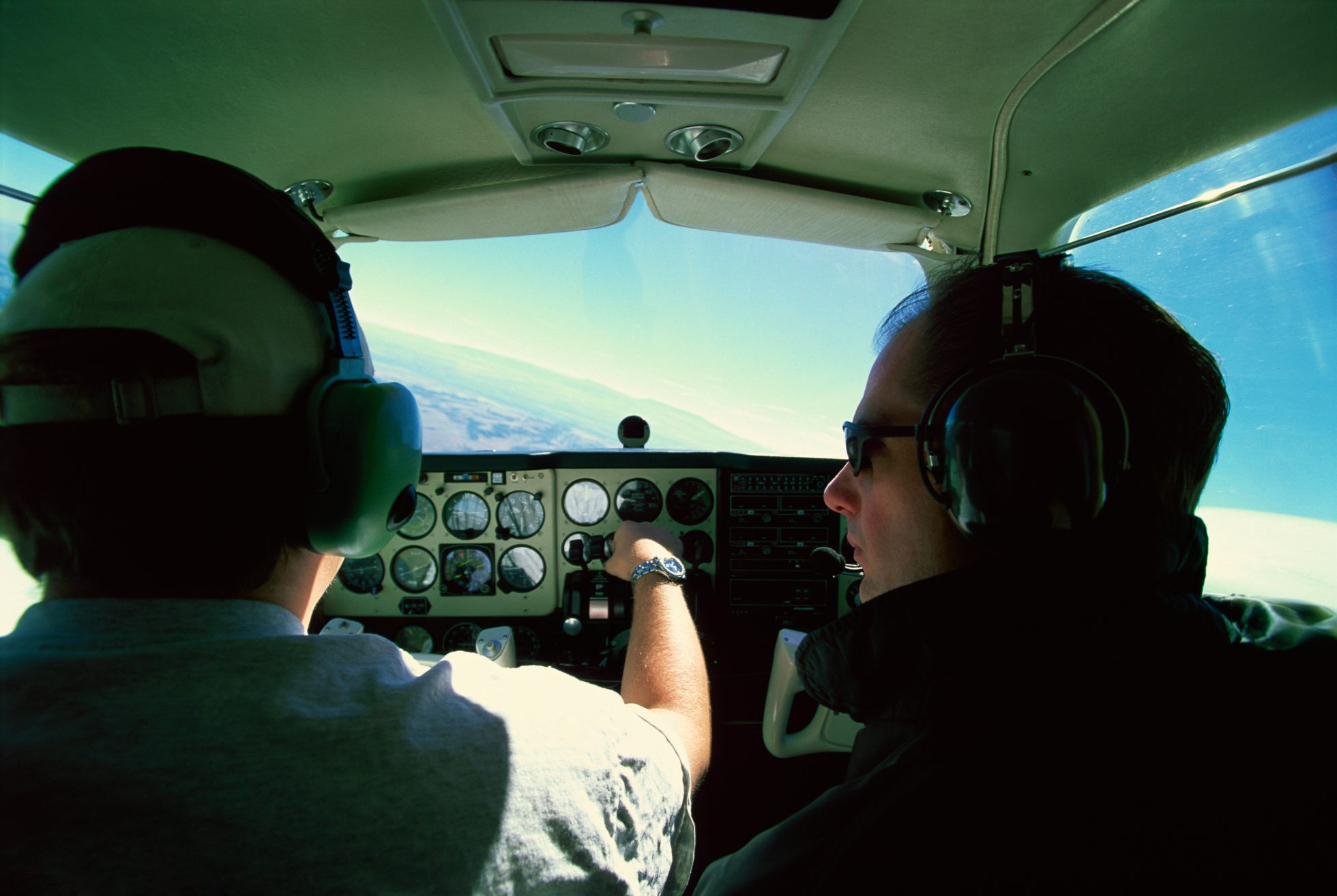Pilot and instructor in a light aircraft
