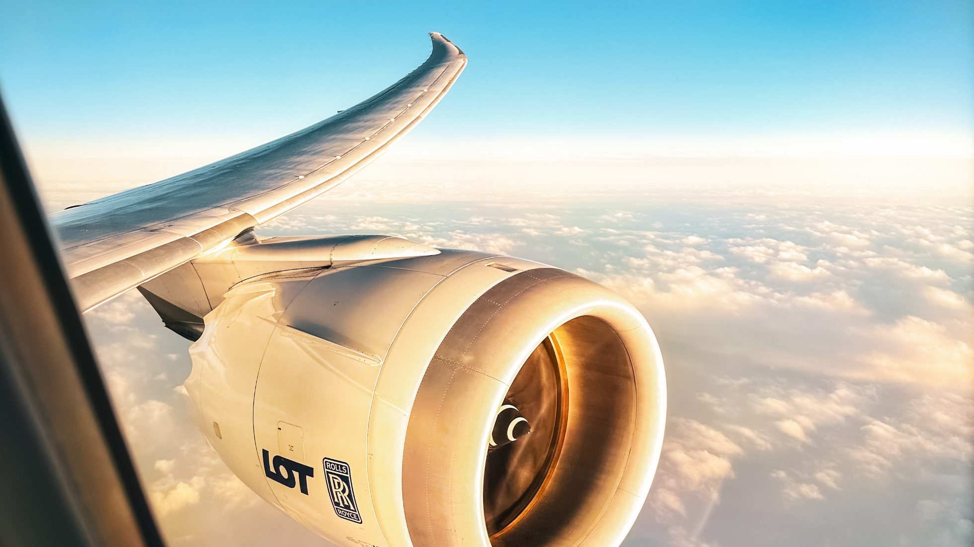 787 Dreamliner wing at sunset