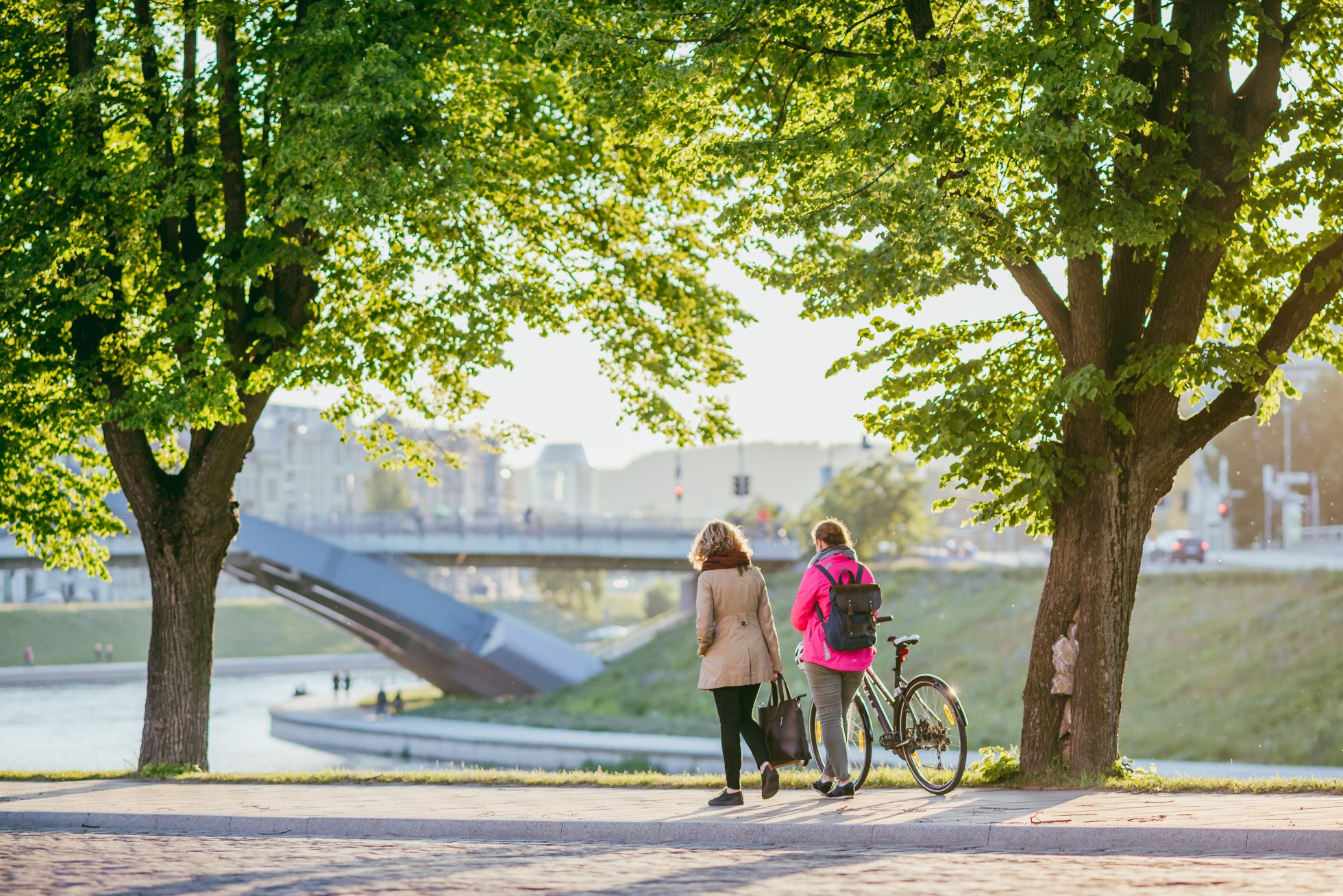 Two people walking in Vilnius