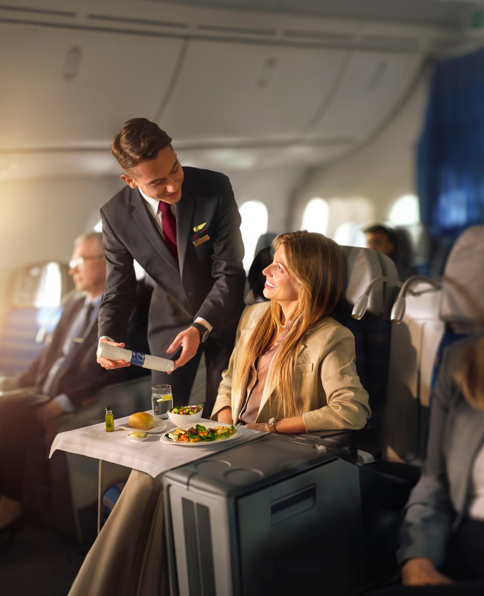 Businesswoman with laptop in LOT Business Class