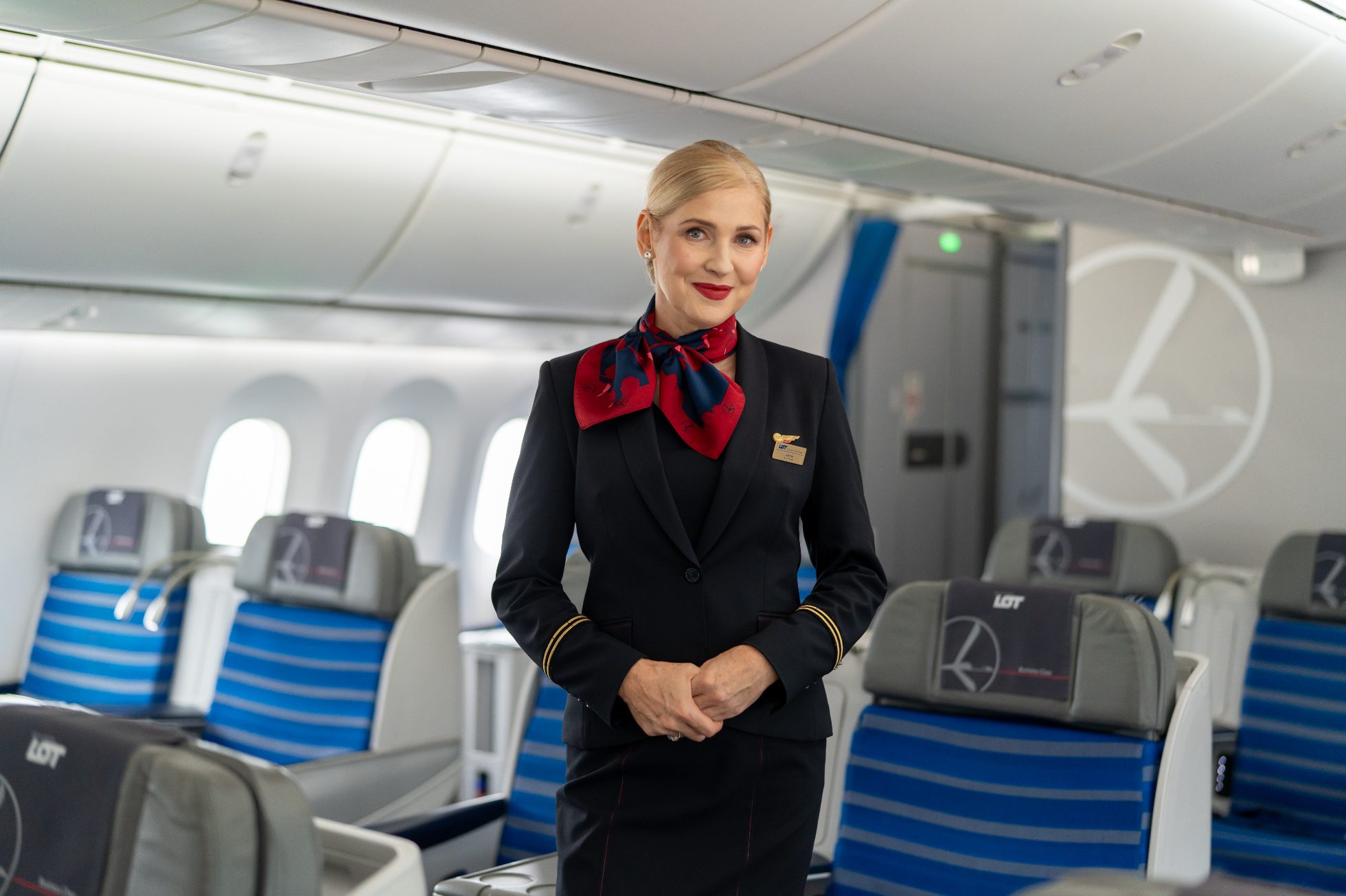 LOT Polish Airlines cabin crew members on board plane