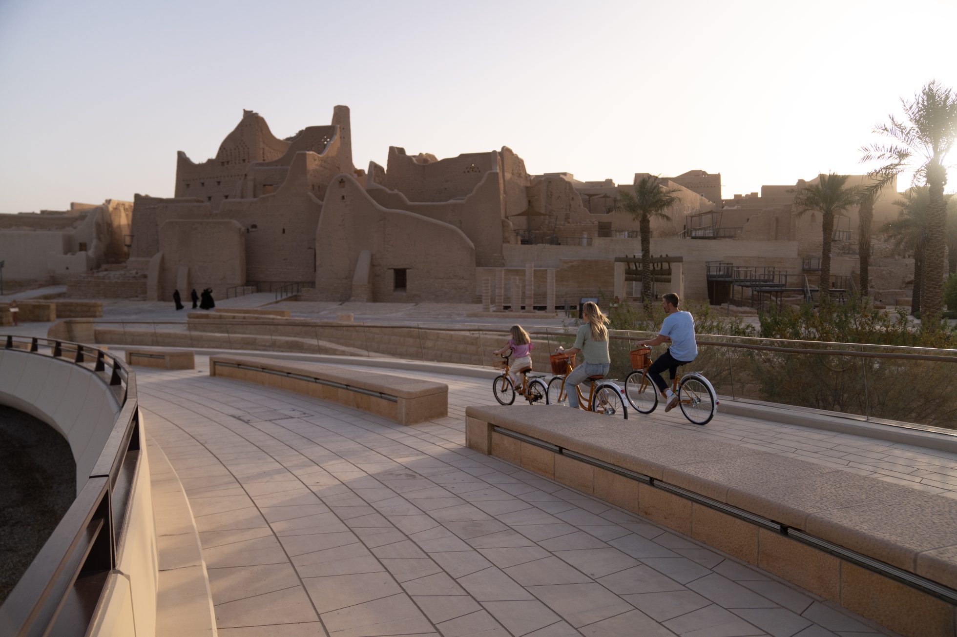 Family on a bike ride in Diriyah