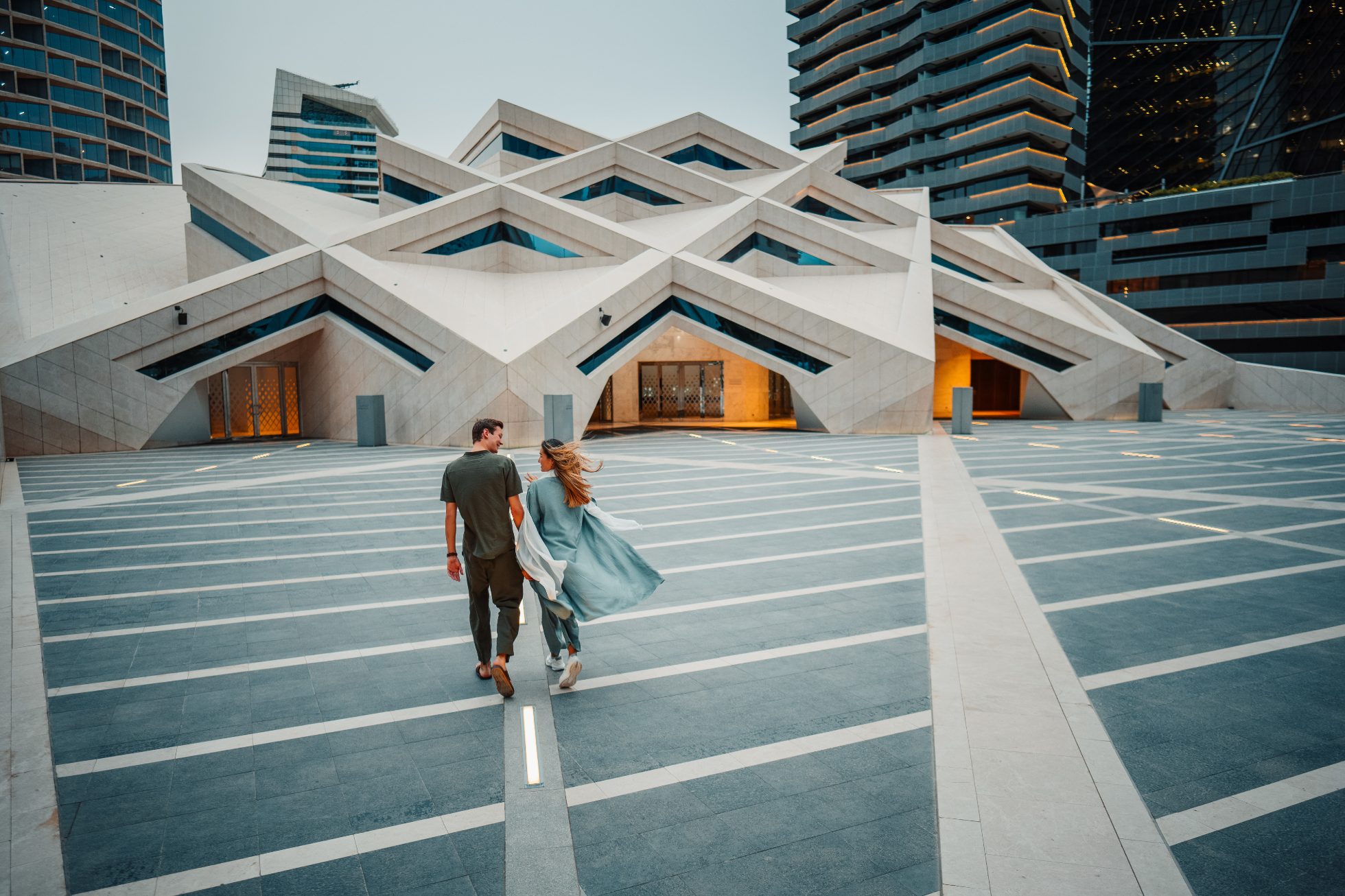 Tourists walking near the KAFD Grand Mosque in Riyadh